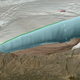 Imagen para el artículo titulado Descubren un enorme cráter producido por un meteorito metálico oculto bajo el hielo de Groenlandia
